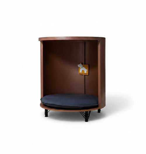 Barkkey Croft cylindrical dog house in brown plywood with black metal legs and a removable dark grey cushion