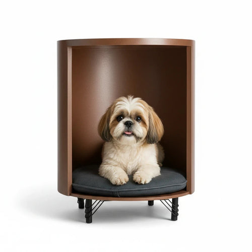 Barkkey Croft cylindrical pet side table in brown with a grey cushion and a small Shih Tzu dog resting inside.